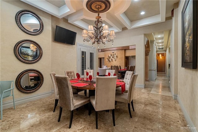 dining room featuring baseboards, coffered ceiling, a towering ceiling, french doors, and a notable chandelier