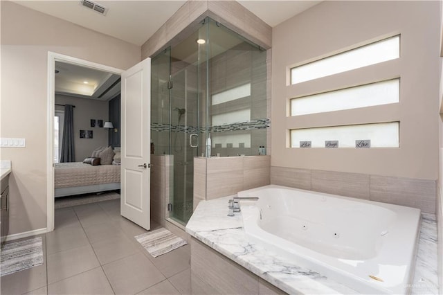 full bath with vanity, visible vents, tile patterned floors, a tub with jets, and ensuite bath