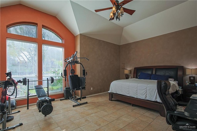 tiled bedroom featuring ceiling fan and vaulted ceiling