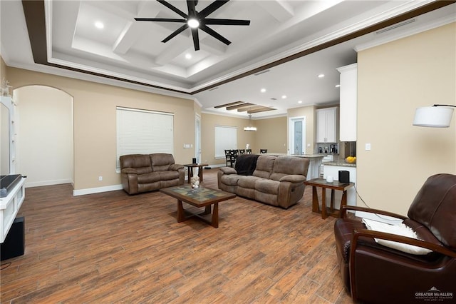 1408 May Dr, Edinburg, TX 78539 - living room with arched walkways, ornamental molding, ceiling fan, recessed lighting, and coffered ceiling
