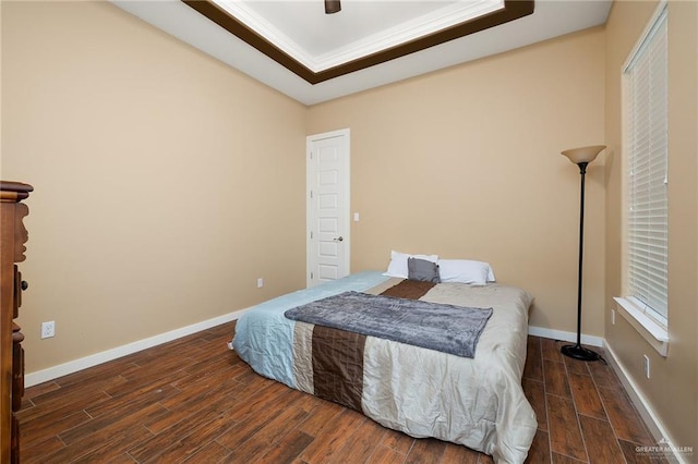 1408 May Dr, Edinburg, TX 78539 - bedroom with baseboards, ornamental molding, a ceiling fan, and wood finished floors