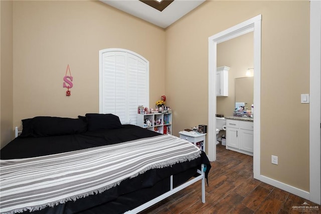 1408 May Dr, Edinburg, TX 78539 - bedroom with baseboards, dark wood finished floors, and ensuite bath