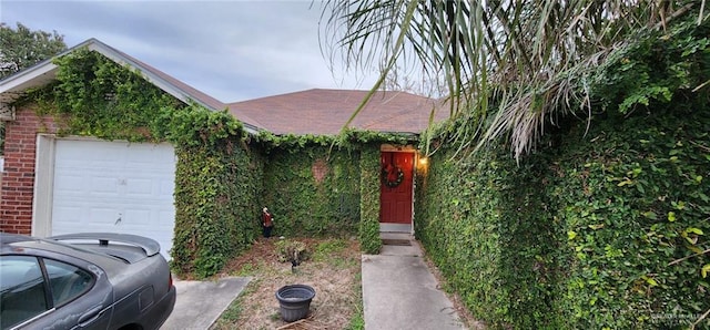 view of property hidden behind natural elements