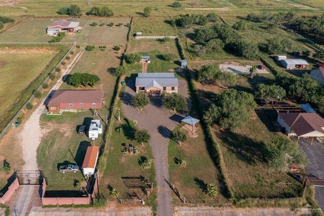 birds eye view of property featuring a rural view