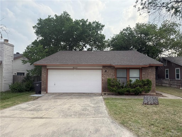 5111 Other, San Antonio, TX 78217 - view of front of property featuring brick siding, driveway, and an attached garage