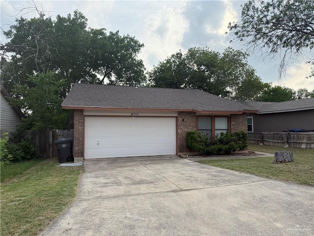 5111 Other, San Antonio, TX 78217 - view of front of property featuring brick siding, concrete driveway, and a garage