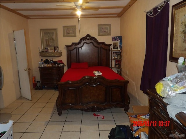 tiled bedroom with ceiling fan