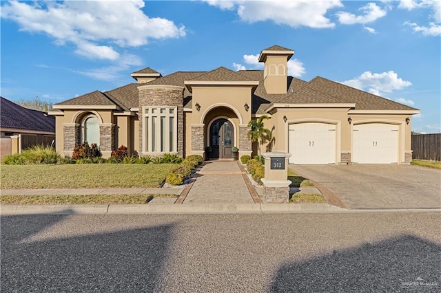 mediterranean / spanish-style house featuring a garage