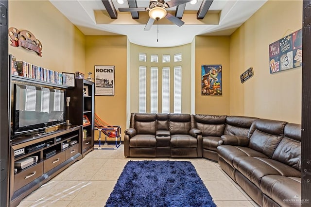 tiled living room with ceiling fan