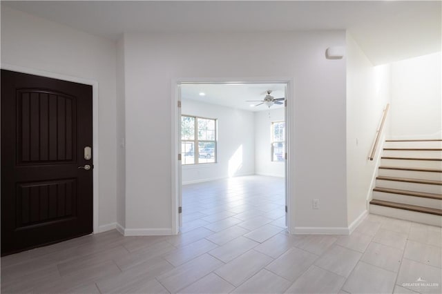 foyer with ceiling fan