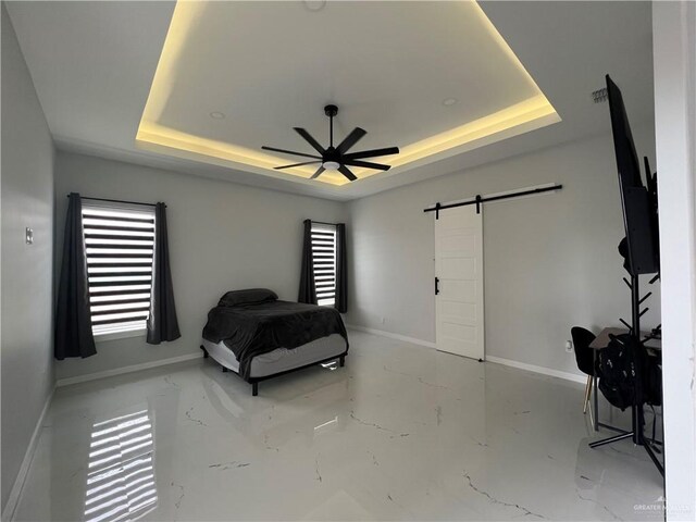 office space featuring ceiling fan, plenty of natural light, and concrete floors