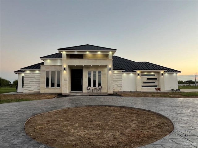 view of front facade featuring a patio area