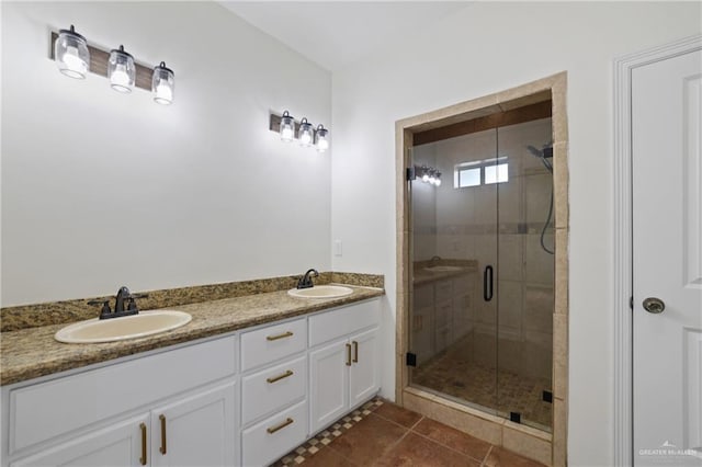 406 Casiano St, Donna, TX 78537 - bathroom with a stall shower, double vanity, and tile patterned floors