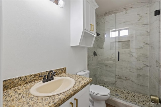 406 Casiano St, Donna, TX 78537 - full bathroom with a shower stall, toilet, and vanity