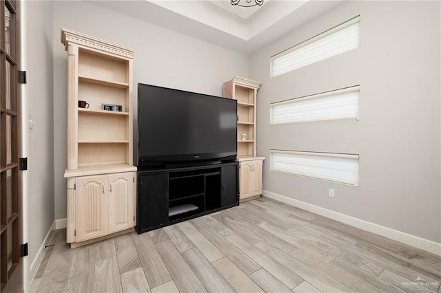 1801 Ozark Ave, Mcallen, TX 78504 - unfurnished living room featuring light wood finished floors and baseboards