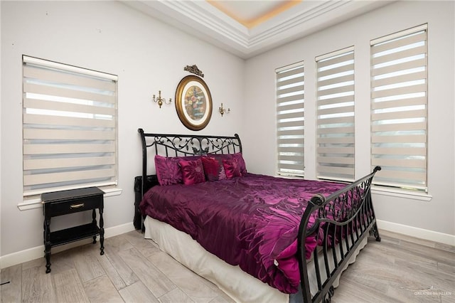 1801 Ozark Ave, Mcallen, TX 78504 - bedroom with multiple windows, baseboards, and wood finished floors