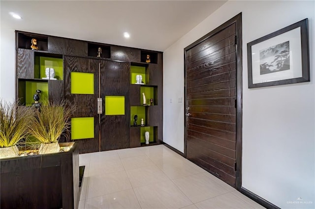 interior space featuring light tile patterned floors