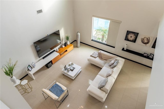 living room with light tile patterned flooring