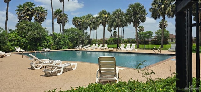 3808 Revilla St, Edinburg, TX 78542 - community pool with fence and a patio area