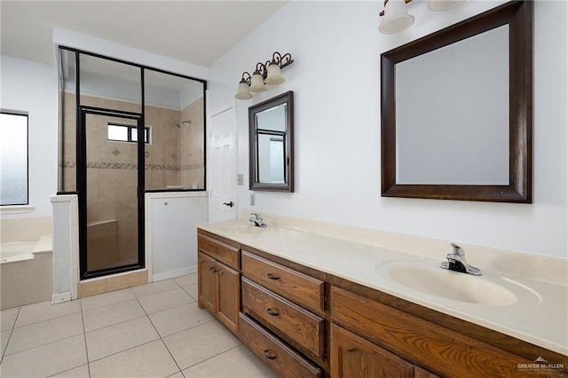 bathroom with separate shower and tub, vanity, and tile patterned floors