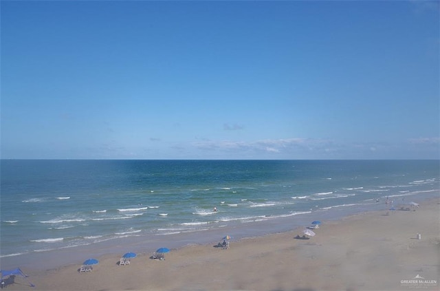 property view of water featuring a beach view