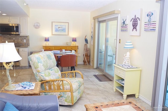 living room with light tile patterned floors