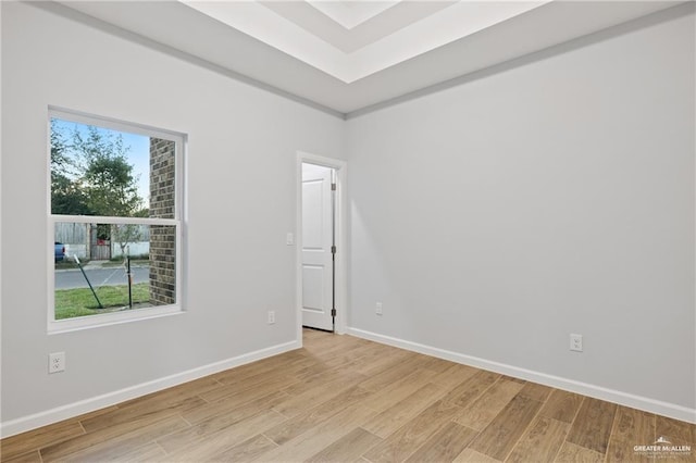 unfurnished room featuring light hardwood / wood-style flooring