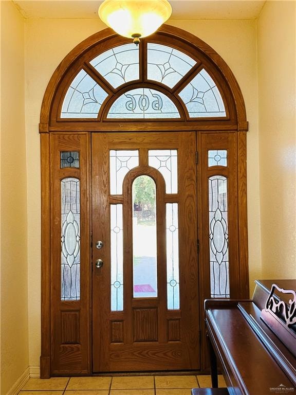 view of tiled foyer entrance