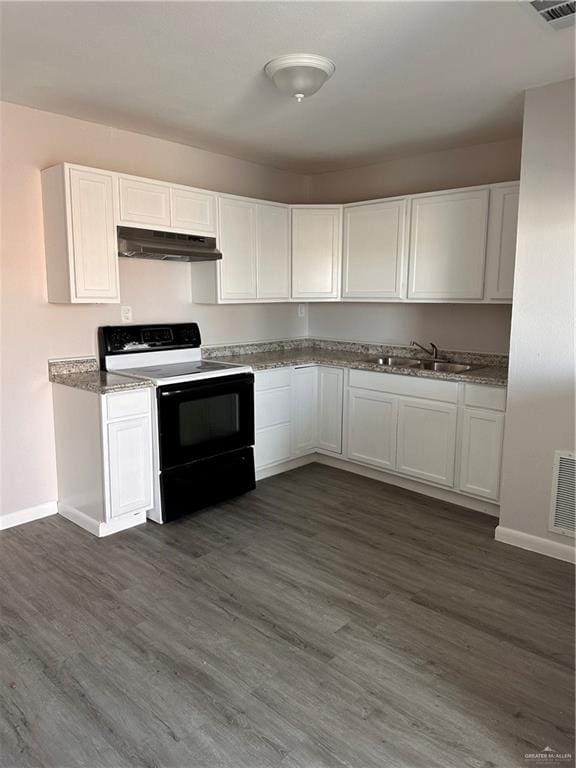 kitchen featuring white cabinets, white range with electric cooktop, dark wood-type flooring, and sink