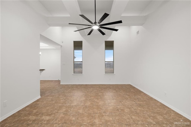 unfurnished room with ceiling fan and lofted ceiling