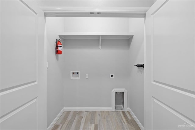 laundry area with washer hookup, hookup for an electric dryer, and light wood-type flooring