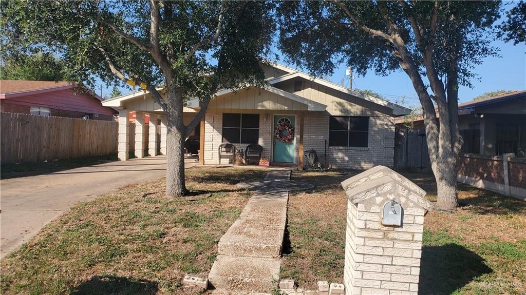 view of front of home with a carport