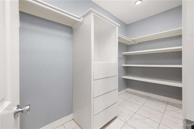 8605 Estrella Dr, Elsa, TX 78538 - spacious closet featuring marble finish floor