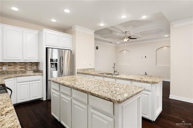 8605 Estrella Dr, Elsa, TX 78538 - kitchen featuring a sink, a center island, dark wood-type flooring, ornamental molding, and coffered ceiling