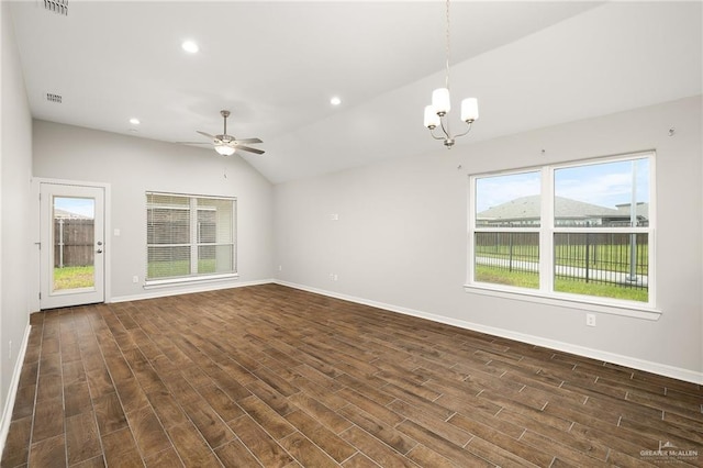 unfurnished room with dark hardwood / wood-style flooring, ceiling fan with notable chandelier, and lofted ceiling