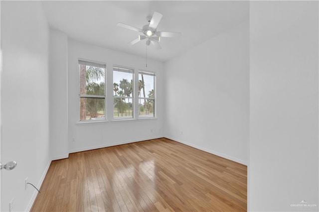 412 Sabine Ct, Mission, TX 78572 - empty room featuring hardwood / wood-style flooring, a ceiling fan, and baseboards
