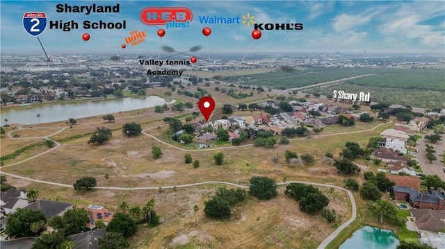 412 Sabine Ct, Mission, TX 78572 - aerial overview of property's location with a large body of water and nearby suburban area