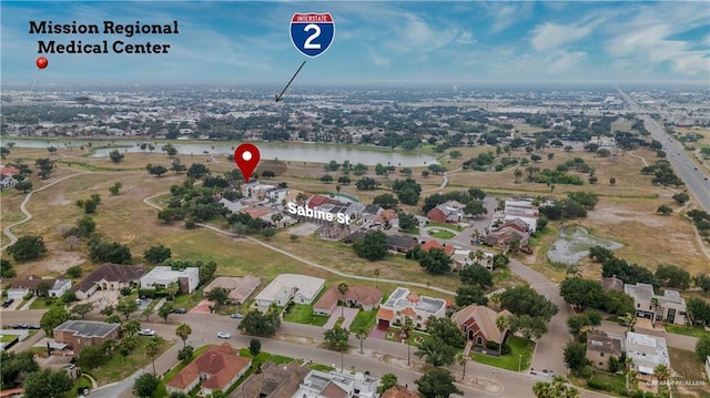 412 Sabine Ct, Mission, TX 78572 - aerial view of property's location with nearby suburban area and a nearby body of water
