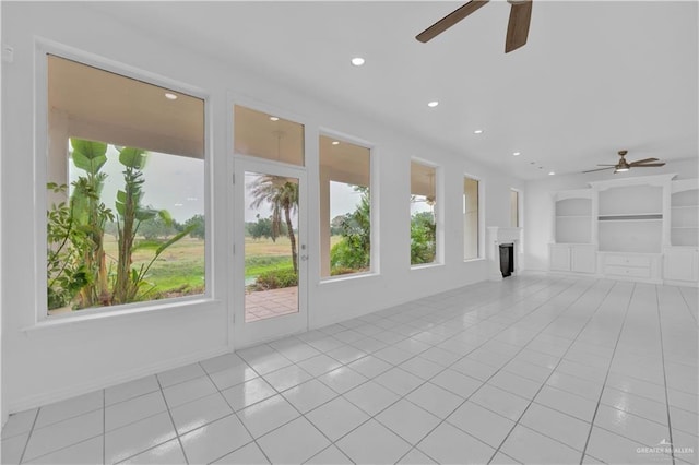 412 Sabine Ct, Mission, TX 78572 - unfurnished living room with ceiling fan, healthy amount of natural light, light tile patterned floors, and recessed lighting