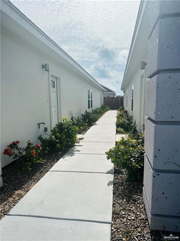 view of side of property featuring stucco siding