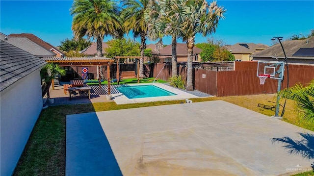 view of swimming pool featuring a pergola, a fenced backyard, a yard, a fenced in pool, and a patio area