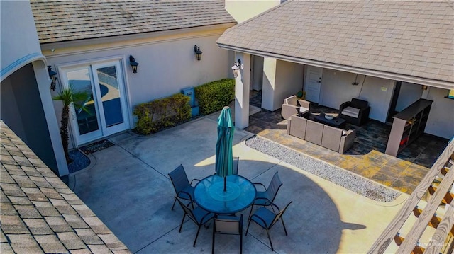 view of patio / terrace featuring an outdoor living space and outdoor dining area