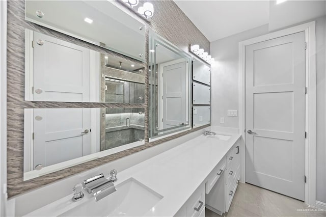 3313 Showboat Dr, Edinburg, TX 78541 - full bath with double vanity, a stall shower, and marble finish floors