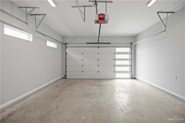 3313 Showboat Dr, Edinburg, TX 78541 - garage with a garage door opener and baseboards