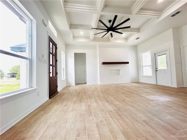 412 S Bowie Ave, Elsa, TX 78538 - unfurnished living room with coffered ceiling, light wood-style floors, beam ceiling, baseboards, and ceiling fan