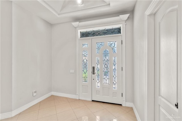 entrance foyer with light tile patterned floors