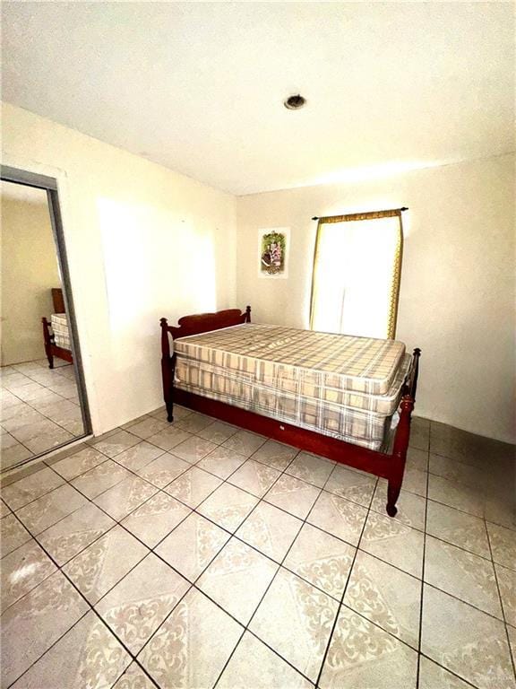2724 La Villita St, Brownsville, TX 78521 - bedroom with light tile patterned floors