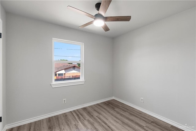2904 N 26th St, Mcallen, TX 78501 - unfurnished room featuring wood finished floors, ceiling fan, and baseboards