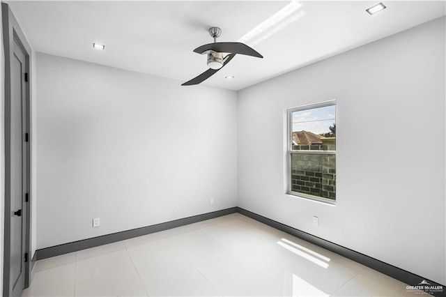 spare room featuring ceiling fan