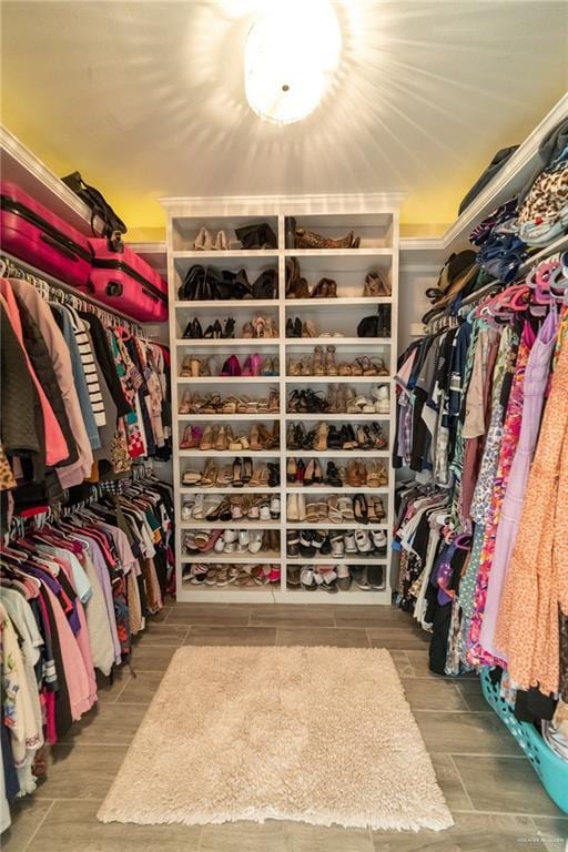 816 Samaria St, Weslaco, TX 78596 - walk in closet featuring wood finish floors
